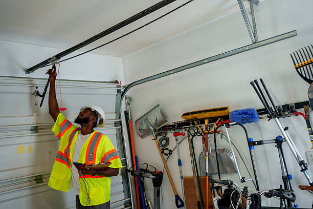 Professional Garage Door Panel Replacement technician working in Binghamton, NY